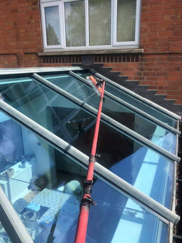 Conservatory roof being cleaned